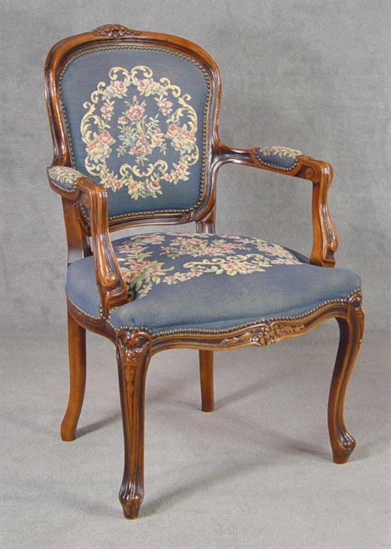 Appraisal: French Style Open Armchair th Century Stained fruitwood Floral tapestry