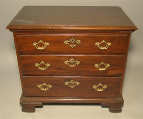 Appraisal: CHIPPENDALE STYLE MAHOGANY THREE DRAWER CHEST The molded top over