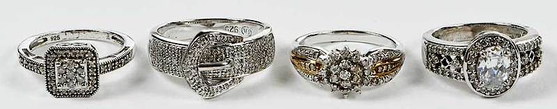 Appraisal: Four Rings three with diamonds and stamped sterling silver sizes