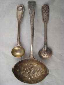 Appraisal: A Georgian silver sauce ladle with later decoration Peter William