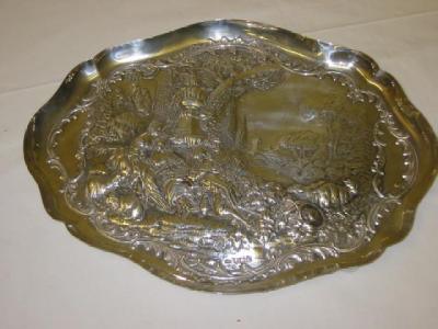 Appraisal: A VICTORIAN TOILET TRAY of shaped oval form embossed with