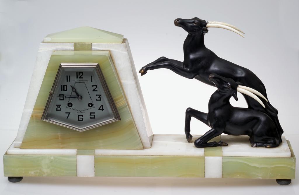 Appraisal: FRENCH ART DECO GARNITURE DE CHEMINEE the clock case in