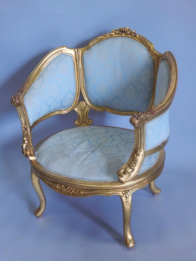 Appraisal: A Continental tub shaped chair with gilded decoration the padded