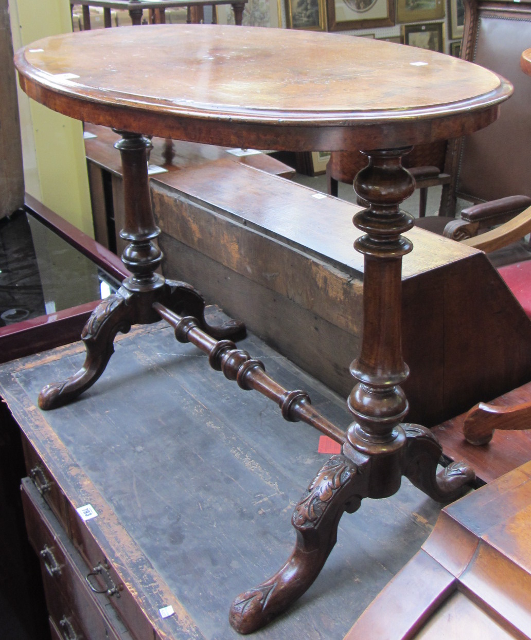 Appraisal: A Victorian figured walnut oval centre table on pair of