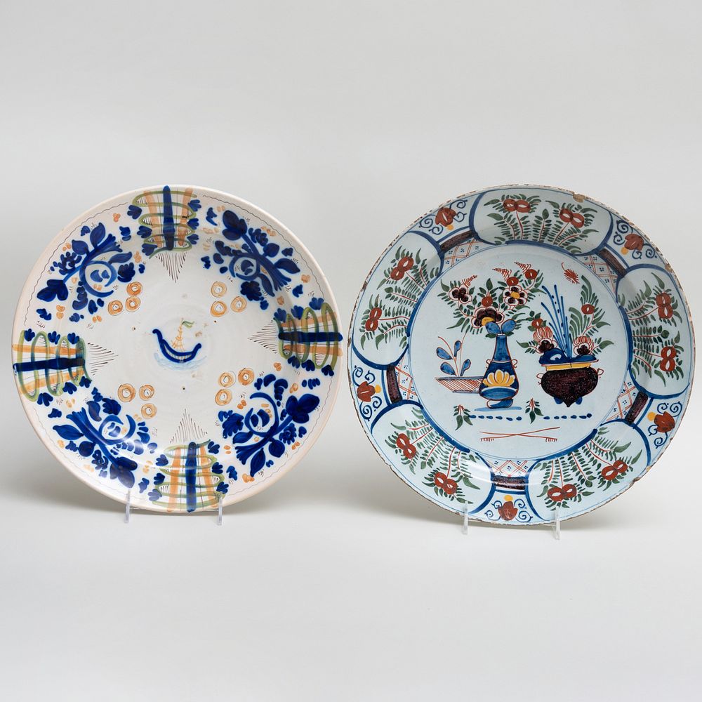 Appraisal: Two Faience Chargers The larger in diam Condition Each with