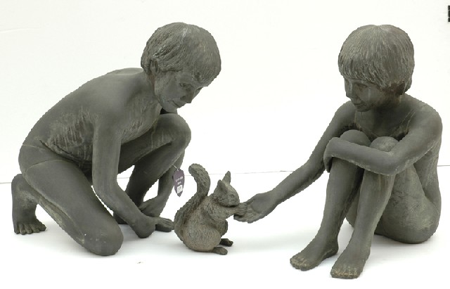 Appraisal: Artist Unknown th Century Boys Feeding a Squirrel pair bronze