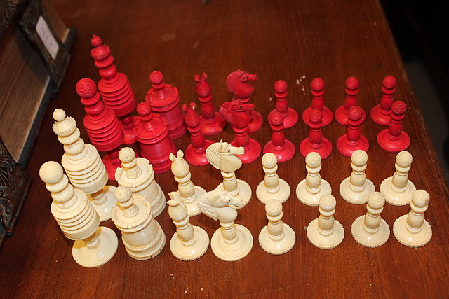 Appraisal: AN ANTIQUE TURNED IVORY CHESS SET