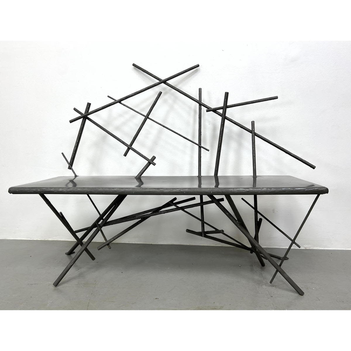 Appraisal: CHRISTOPHER POEHLMANN Studio Made Bench Metal bench with branch form