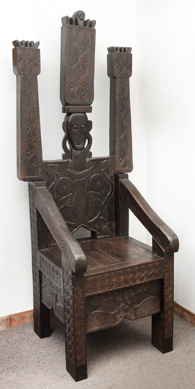 Appraisal: CARVED AFRICAN THRONE CHAIR Back carved with stylized figure of