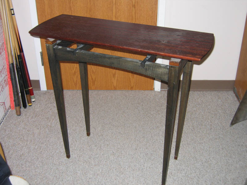 Appraisal: AMERICAN CRAFT CONSOLE TABLE rectangular rosewood top over an exotic