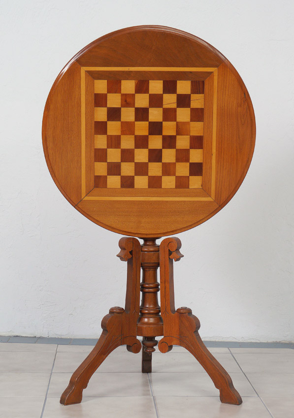 Appraisal: TH CENTURY VICTORIAN TILT TOP INLAID GAME TABLE Parquetry inlaid