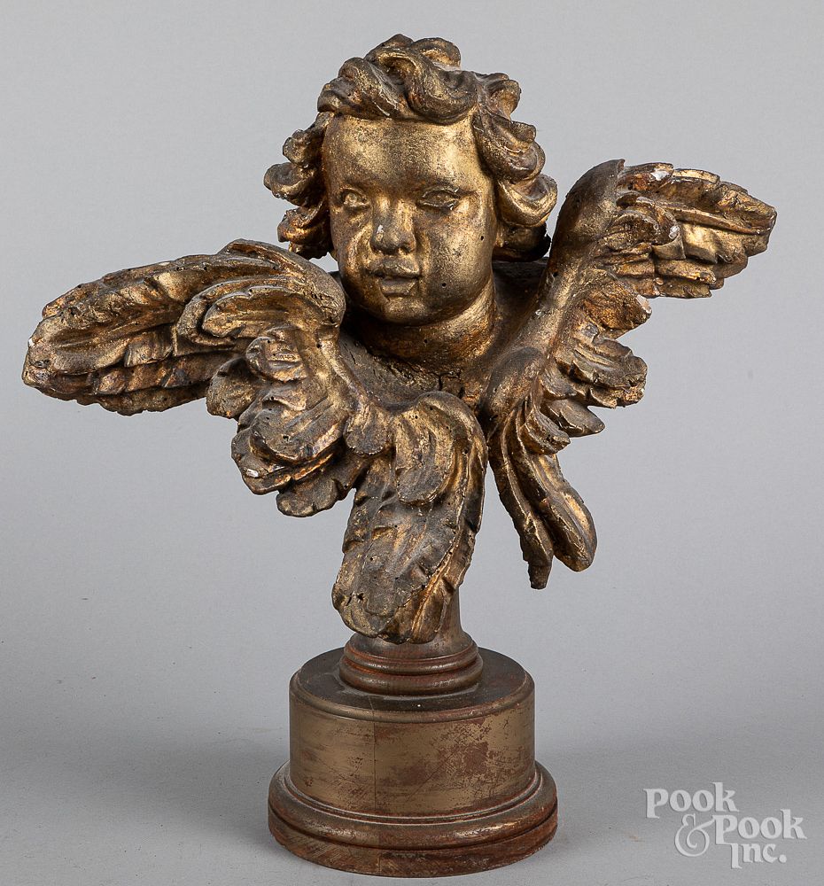 Appraisal: Carved and gilt cherub th c Carved and gilt cherub