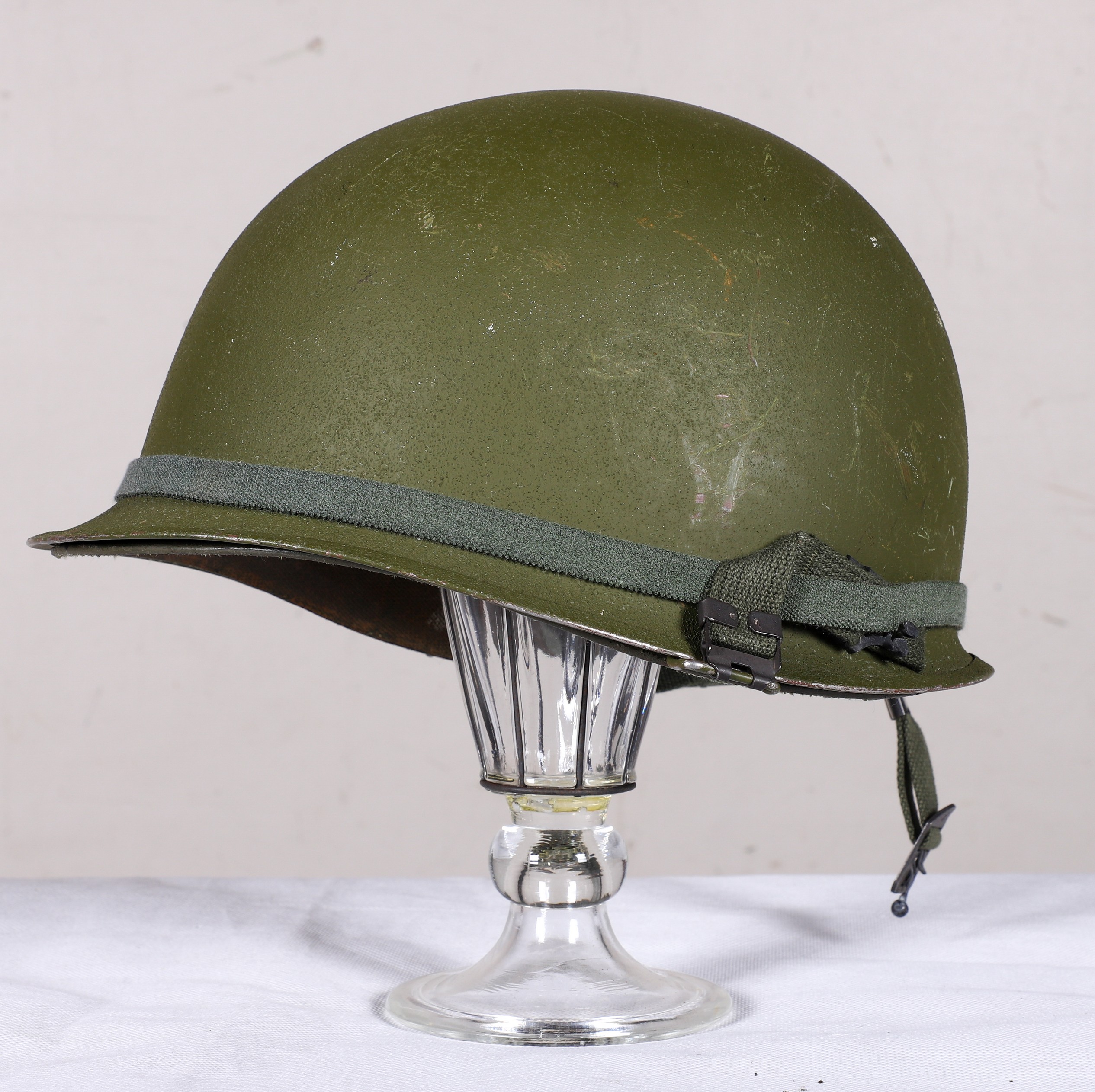 Appraisal: M helmet and liner Vietnam era helmet and liner either