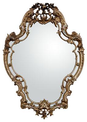 Appraisal: Venetian rococo style carved and paint-decorated mirror cartouche form with