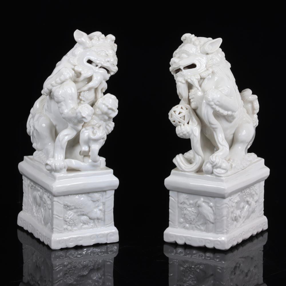 Appraisal: PAIR OF LARGE INCH BLANC DE CHINE PORCELAIN FOO DOG