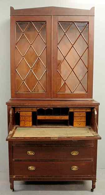 Appraisal: Sheraton mahogany two-part secretary butler's bookcase c with cross-hatched mullion