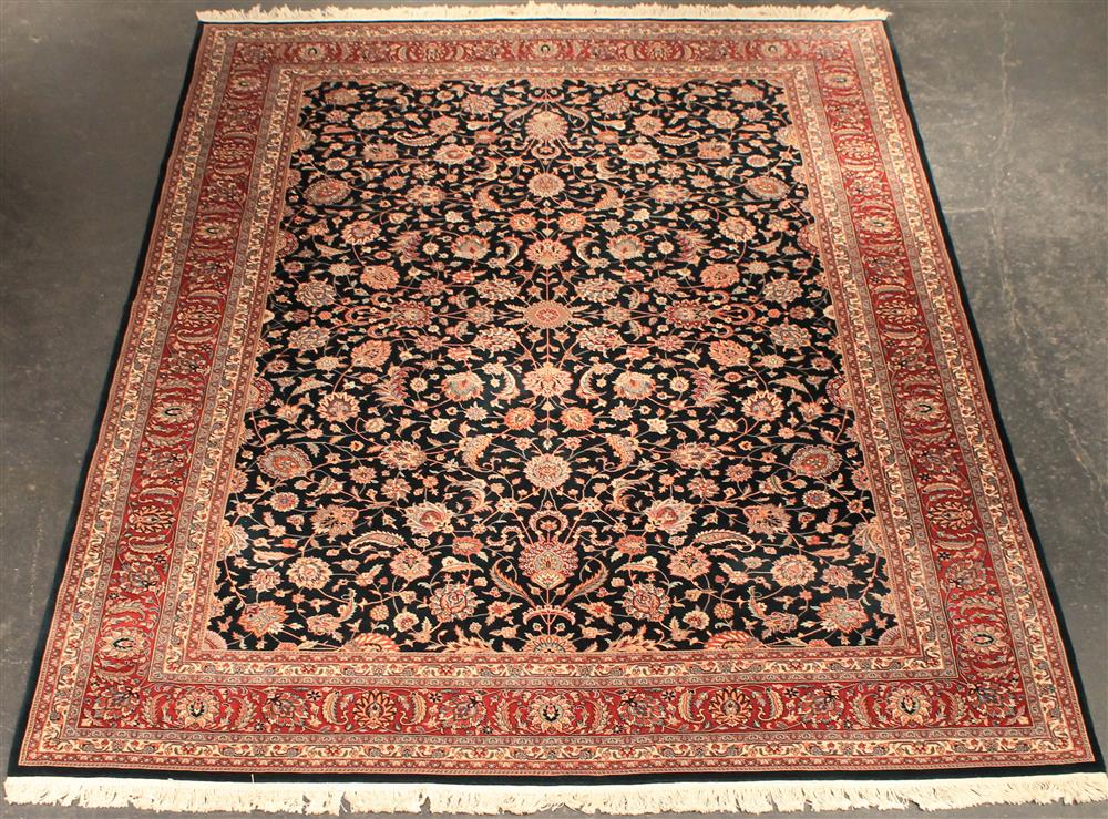 Appraisal: INDO-PERSIAN ISFAHAN DESIGN RUG all over design on black field