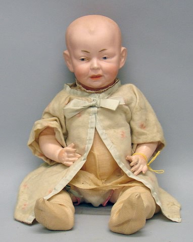 Appraisal: L cir Germany character baby Solid dome head Minor kiln