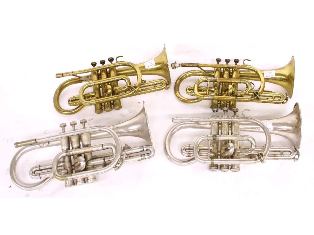 Appraisal: Two Lark brass cornets silver plated Lark cornet and a