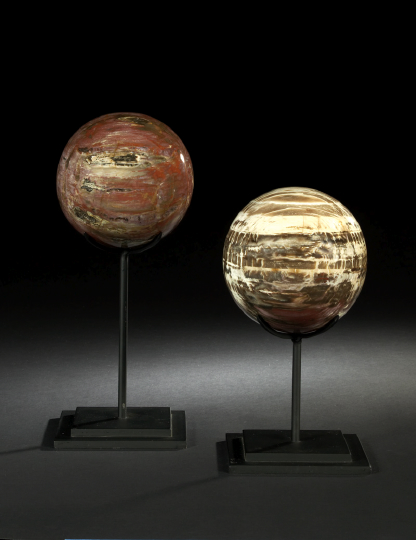 Appraisal: Dramatic Pair of Spherical Agate Specimens the smaller of brown