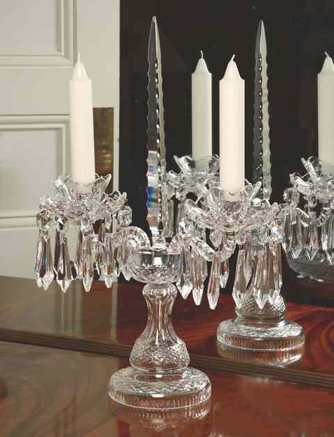 Appraisal: A WATERFORD CUT GLASS TWO BRANCH CANDELABRUM with central pointed