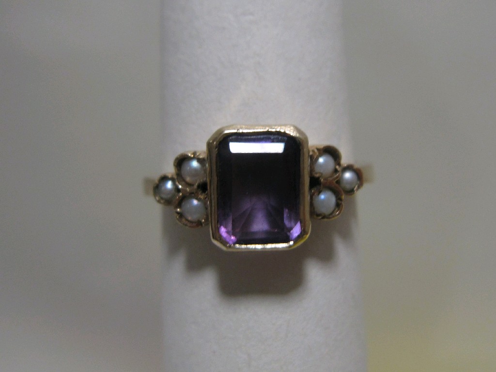 Appraisal: Nine carat gold amethyst and seed pearl set dress ring