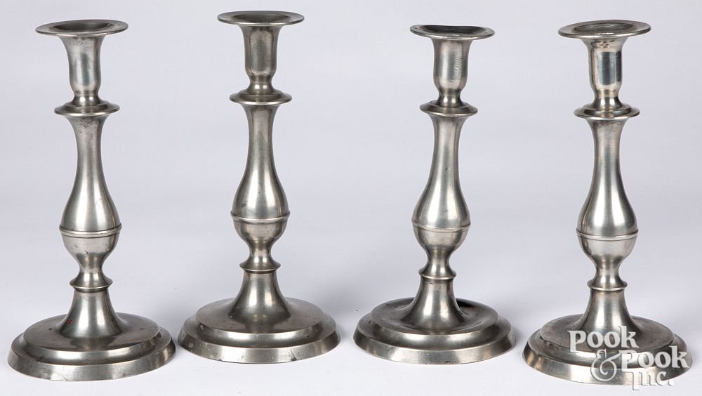 Appraisal: Set of four pewter candlesticks th c Set of four