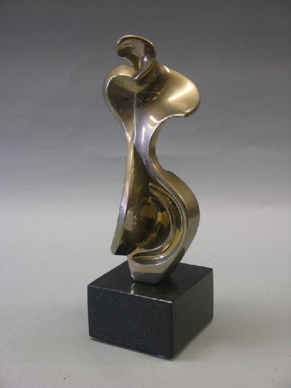 Appraisal: A contemporary bronze sculpture by Jean-Guy Dallaire a scrolling torso