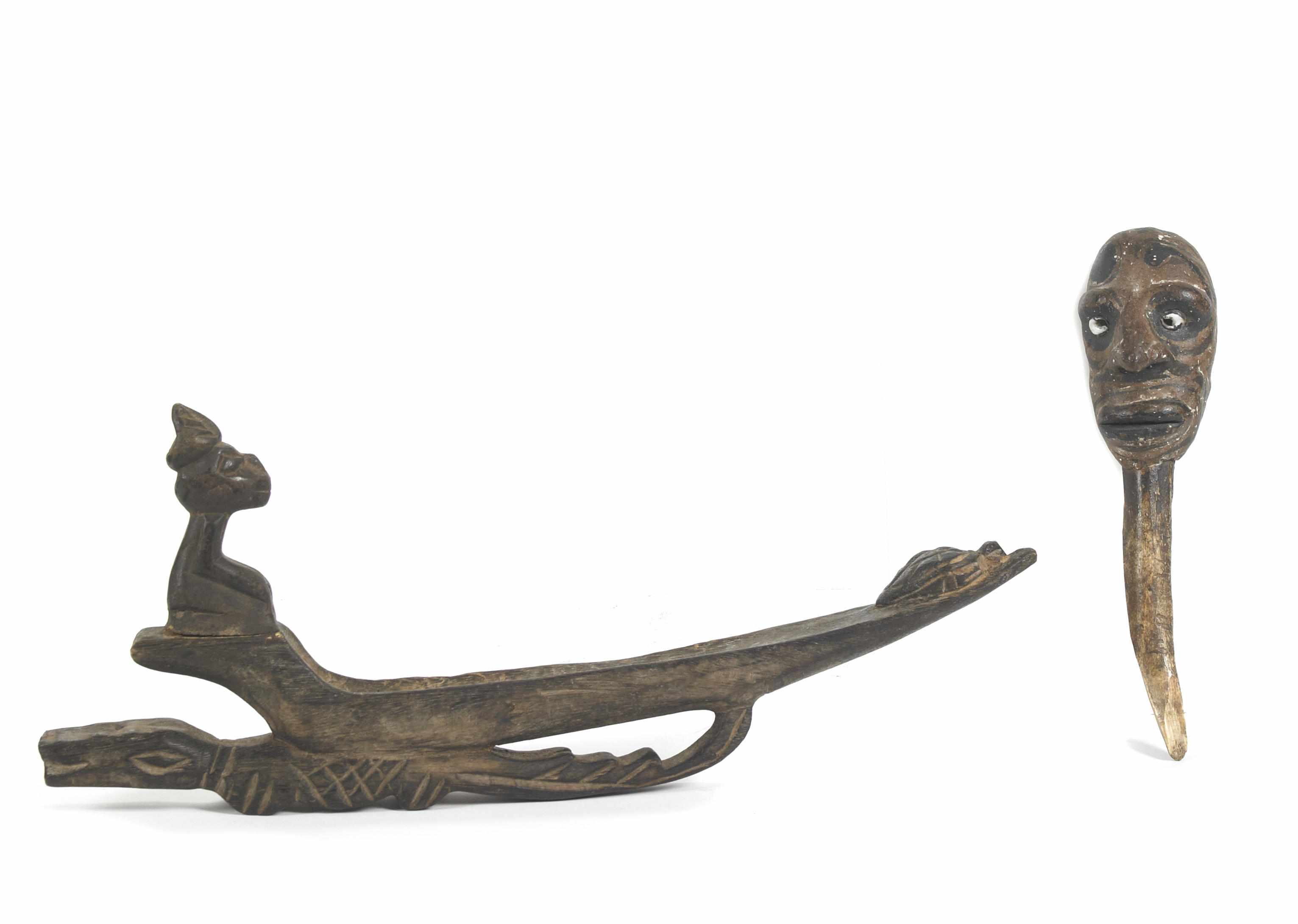 Appraisal: A patinated bronze figure of a recumbent animal together with