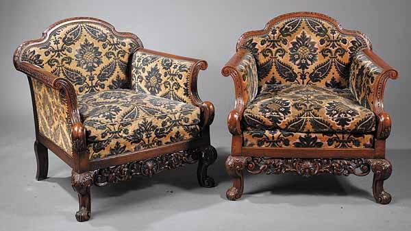 Appraisal: A Pair of Anglo-Indian Walnut Club Chairs the shaped backs