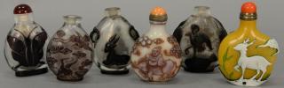 Appraisal: Six overlay glass snuff bottles including five dark amber with