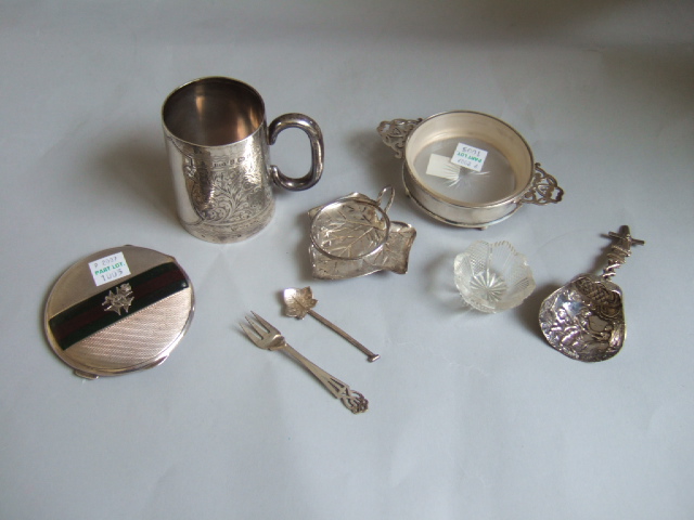 Appraisal: A silver christening mug with scroll engraved decoration Birmingham a