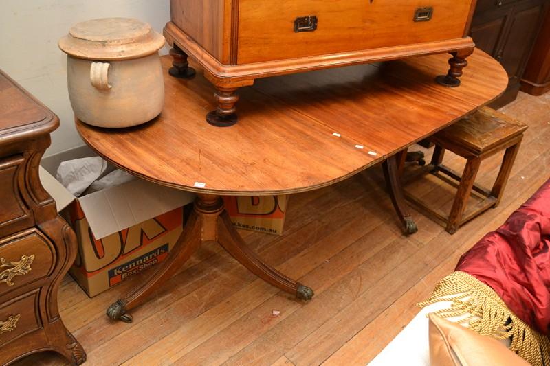 Appraisal: A REGENCY STYLE EXTENSION DINING TABLE WITH ONE LEAF A