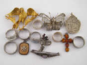 Appraisal: A mixed lot comprising a gilt metal tests silver brooch