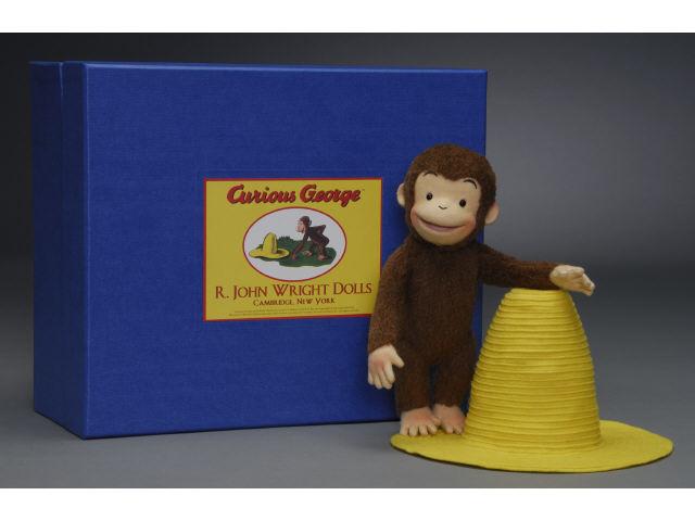 Appraisal: R John Wright Curious George The Yellow Hat Alpaca plush