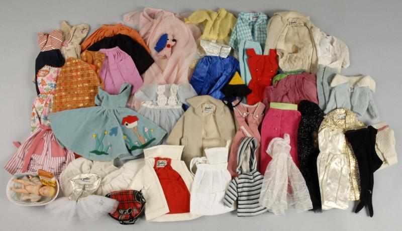 Appraisal: Giant Lot of Vintage Barbie Doll Clothing Description Group dates