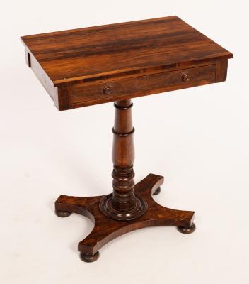 Appraisal: An early Victorian rosewood table fitted a drawer on a