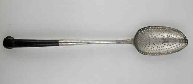 Appraisal: A George III silver drainer spoon WJ London the carved