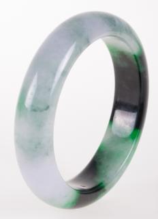 Appraisal: Jade Bangle Bracelet Multicolored jade bracelet with colors ranging from