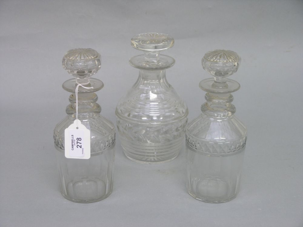 Appraisal: A pair of early Victorian glass decanters each with cut