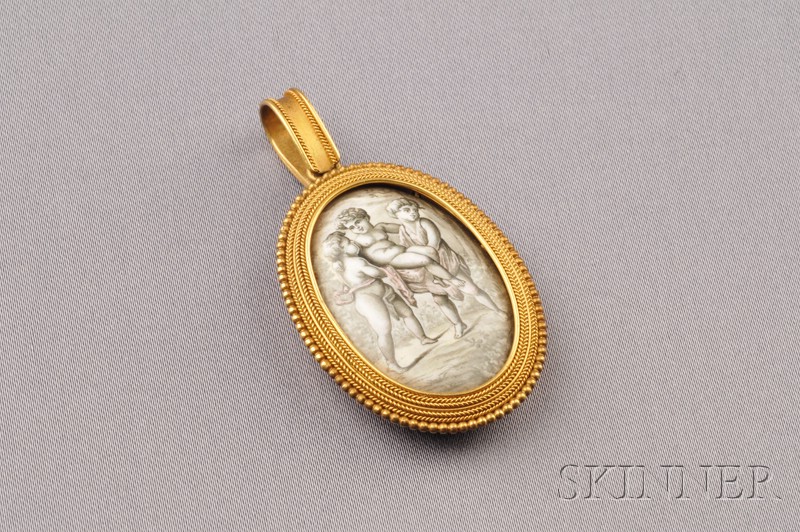 Appraisal: Etruscan Revival kt Gold Pendant Locket depicting three cherubs en