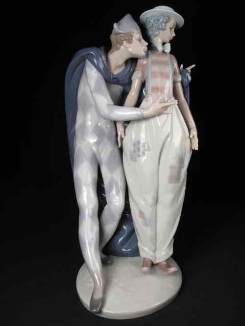 Appraisal: Large Lladro porcelain figurine depicting male and female clown figures