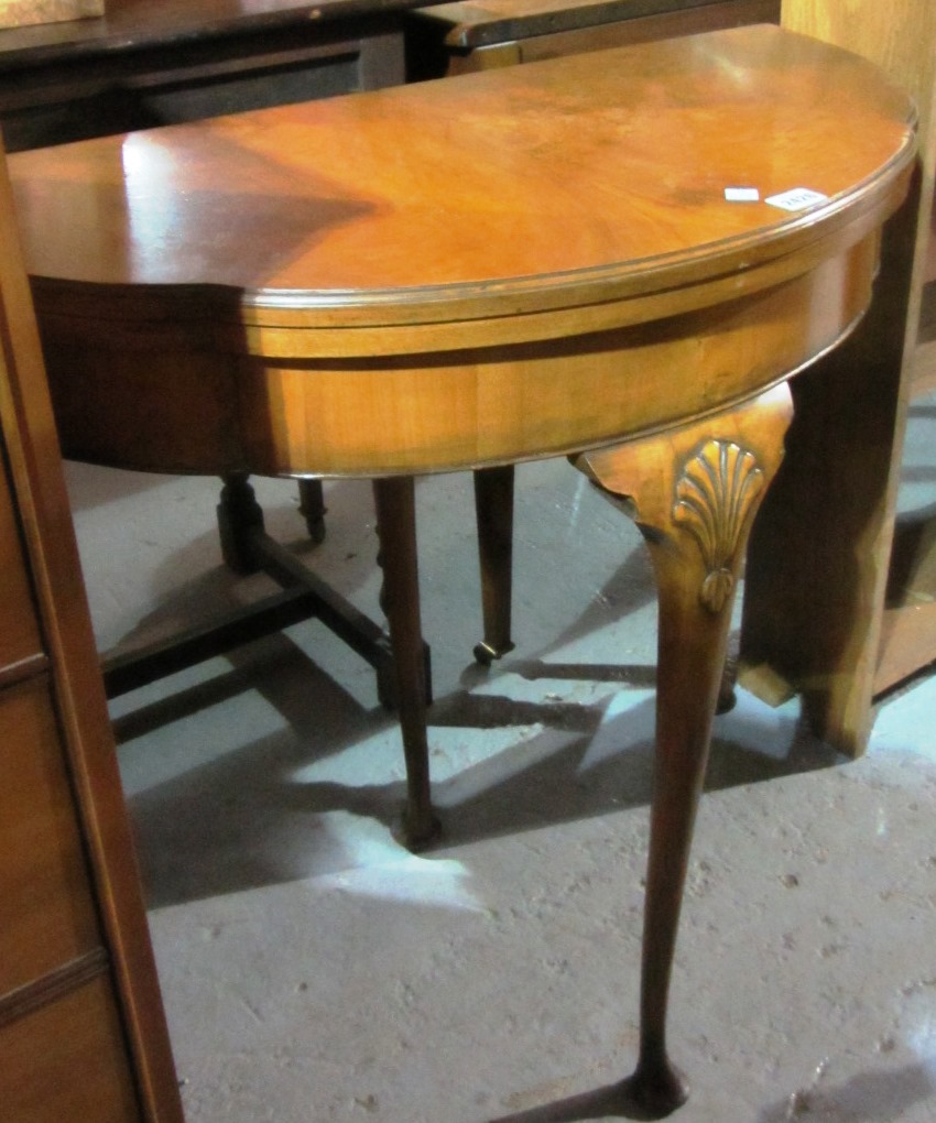 Appraisal: A th walnut fold over card table