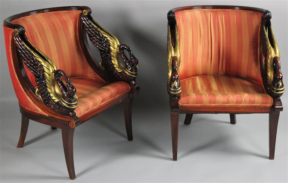 Appraisal: PAIR OF EMPIRE STYLE CHAIRS WITH SWAN CARVED ARMS STRIPED