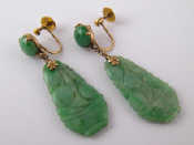 Appraisal: A pair of jade earrings with yellow metal tests carat