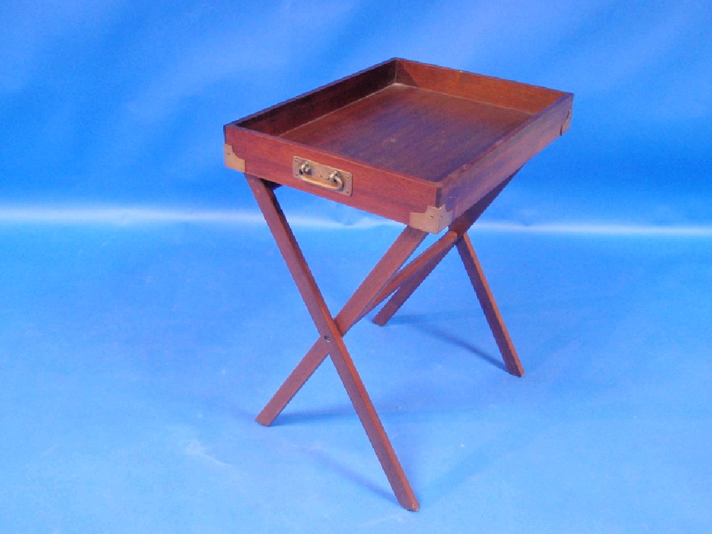 Appraisal: Mahogany brass-bound butler's tray with stand