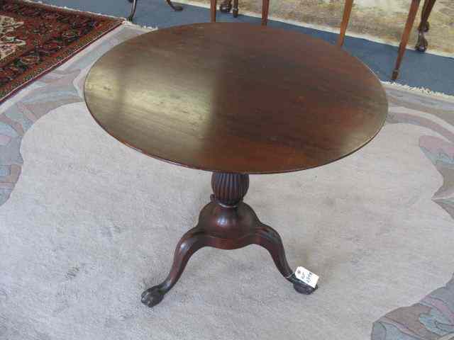 Appraisal: Victorian Mahogany Table '' round top tri-footed lion paw base