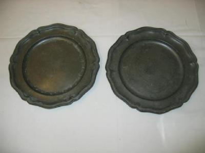 Appraisal: A PAIR OF GEORGIAN PEWTER PLATES with moulded shaped rim