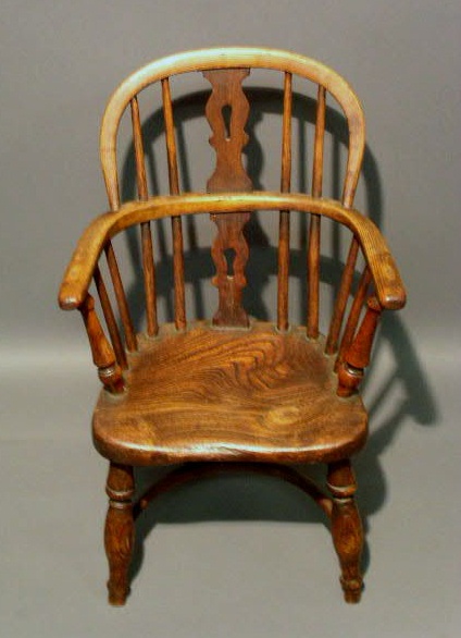 Appraisal: Childs Windsor armchair th c English yew wood h x