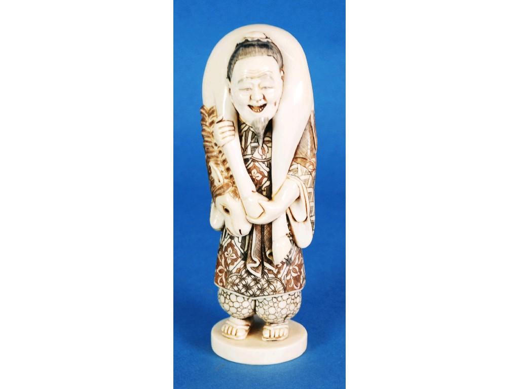 Appraisal: TH CENTURY ORIENTAL CARVED IVORY FIGURE OF A MAN CARRYING